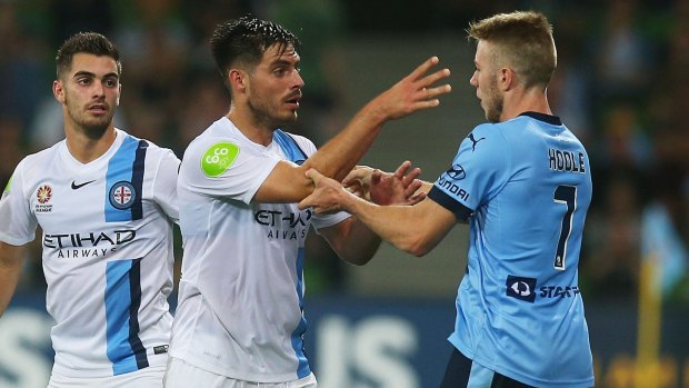 Disagreement: Melbourne City star Bruno Fornaroli and Sydney FC opponent Andrew Hoole have an argument during their A-League clash in March.