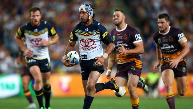 Premium viewing content: Johnathan Thurston makes a break during the 2015 NRL grand final.