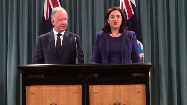 Commissioner Michael Byrne, with Premier Annastacia Palaszczuk during the handing down of the report.