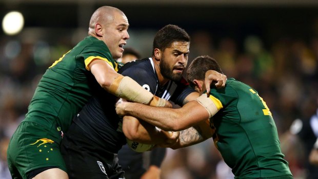 New Zealand's Jesse Bromwich is tackled during the Anzac Test match in Canberra.