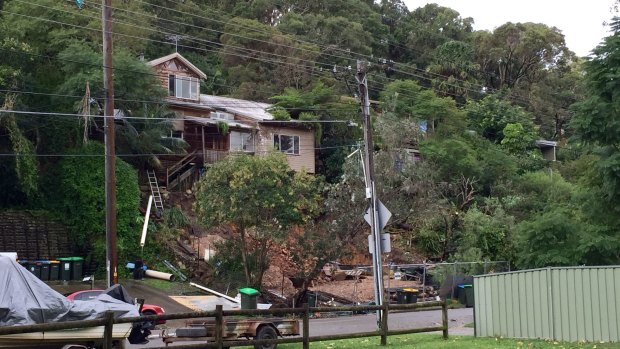 Witness: A house in North Narrabeen close to collapsing due to the storm.