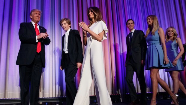 Donald Trump arrives to speak to an election night rally with his family and third wife, Melania. Kushner is third from right.