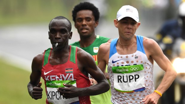 Olympic marathon: Feyisa Lilesa, centre, racing eventual winner Eliud Kipchoge of Kenya and bronze medallist Galen Rupp of the United States.