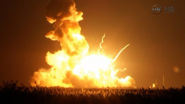 Destoyed: The unmanned rocket blows up over the launch complex at Wallops Island, Virginia.