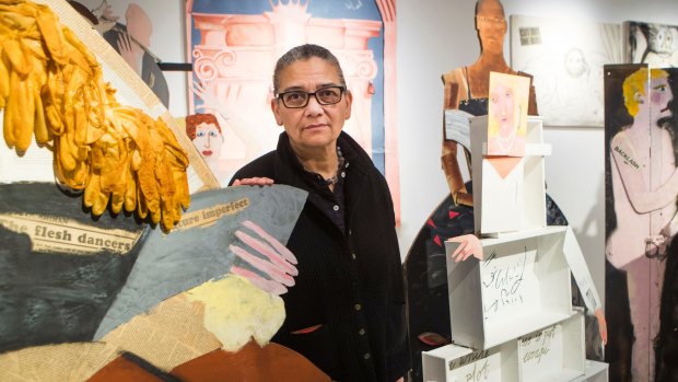 Turner Prize winner Lubaina Himid with one of her works at the Ferens Art Gallery in Hull.