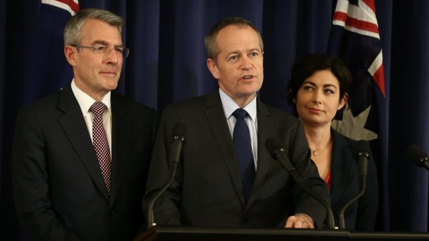 Opposition Leader Bill Shorten announces Labor's decision with Mark Dreyfus (left) and Terri Butler (right).