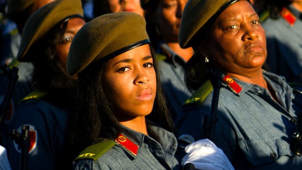 Female soldiers march in a military parade through Revolution Square in honour of late Cuban leader Fidel Castro in Havana on Monday.