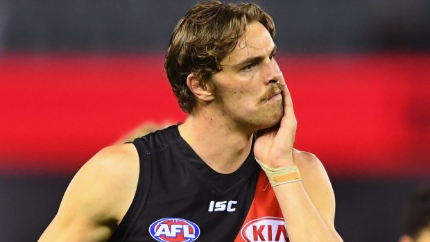 Off target: Bombers forward Joe Daniher leaves the ground after loss to the Demons.