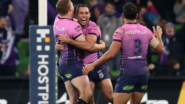 Coin quip: Cameron Smith celebrates his match-winning goal. At kick-off he had jested with Queensland teammate Greg Inglis over the coin toss.