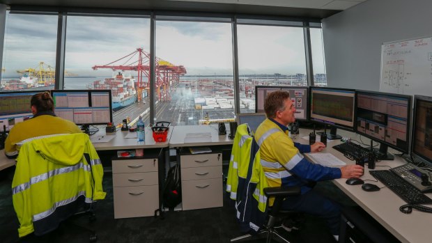 Some of the few human workers who remain at the new automated centre at Port Botany.