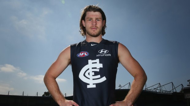 Bryce Gibbs poses as he unveils Carlton's guernsey for 2015.
