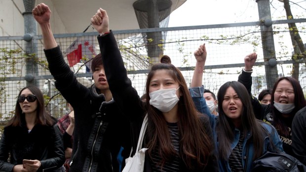 French-Chinese were outraged at the police killing of a Chinese man in his home. 