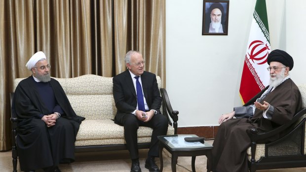 Iran's Supreme Leader Ayatollah Ali Khamenei, right, with Swiss President Johann Schneider and Iranian President Hassan Rouhani  in Tehran on Saturday. 