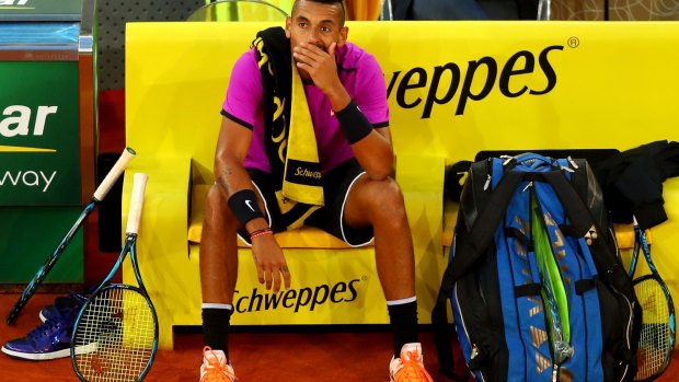 Stumped: Kyrgios could not match Nadal's clay court game.