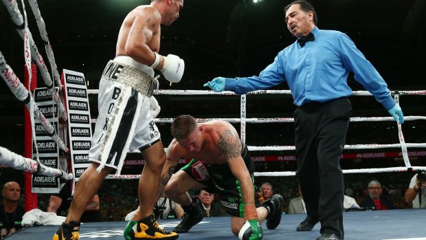 The fight almost ended after 30 seconds after a cheap shot from Mundine.
