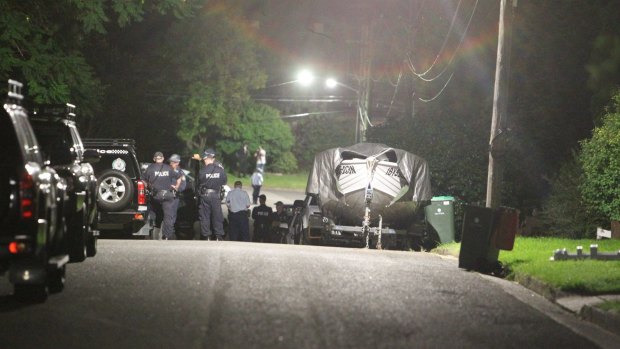 The scene at Winbourne Street, West Ryde after a fatal shooting at the Ghalloubs' home.
 