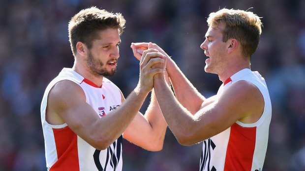 Jesse Hogan (left) has met Wayne Carey in a bid to break a form slump.