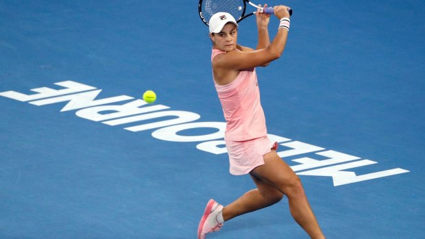 Australia's Ashleigh Barty makes a backhand return to Petra Kvitova of the Czech Republic during their quarterfinal match at the Australian Open in 2019.