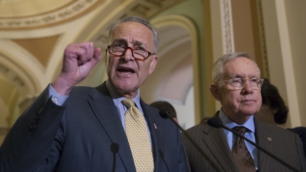 Democratic senators Charles Schumer and Harry Reid  criticise Republican legislators for being too tied to the NRA and the gun lobby in Washington on Tuesday.