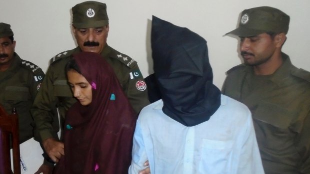 Aasia Bibi and her boyfriend Shahid Lashari are presented to journalists. Bibi is alleged to have poisoned her future husband's milk, inadvertently killing 17 other people in a remote village.