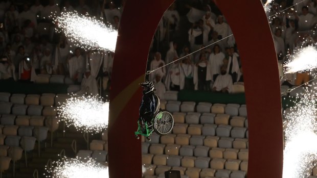 Aaron Wheelz rides off a ramp at the opening ceremony of the Rio 2016 Paralympic Games at Maracana Stadium.