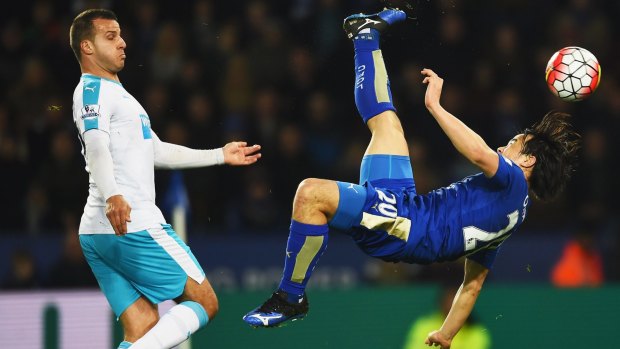 Shinji Okazaki leaves the deck for Leicester City's first goal.