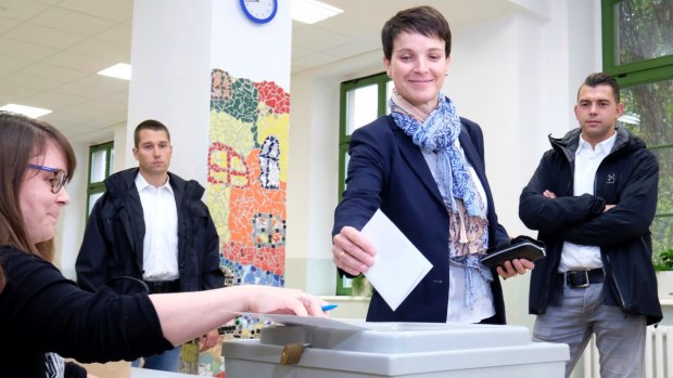 Head of the anti-immigrant Alternative for Germany (AfD), Frauke Petry, votes in Leipzig.