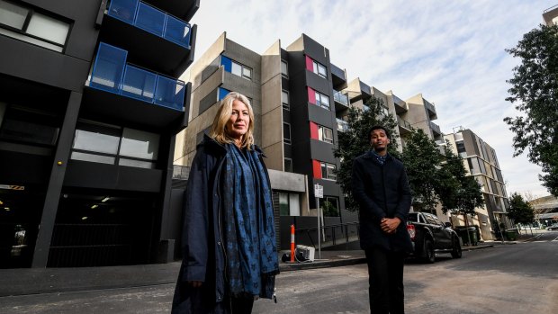Melbourne University academics Kate Shaw and Abdullahi Jama in front of public (left), and private (right) apartments. 