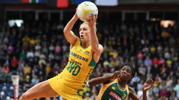 Gabi Simpson of Australia fights for the ball against South Africa.