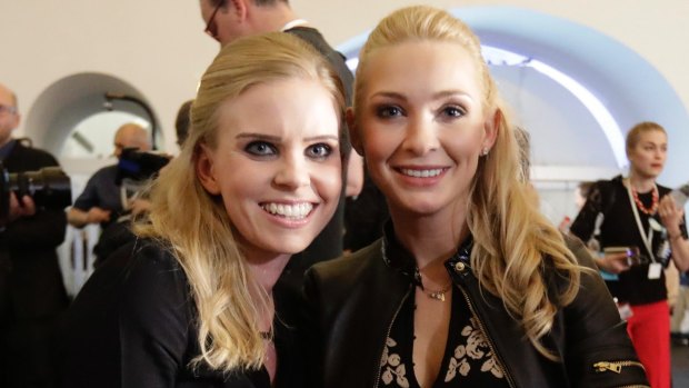 Susanne Thier, left, girlfriend of Foreign Minister Sebastian Kurz, and Philippa Strache, wife of Freedom Party leader Hans-Christian Strache, in Vienna, on Sunday.