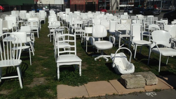 Heartrending: A baby's crib is among the 185 White Chairs commemorating those killed in the 2011 Christchurch earthquake.