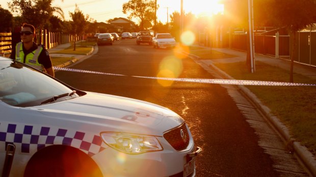 The suburban street in Albanvale, cordoned off after the grisly discovery of the bodies of a grandmother and her grandson.