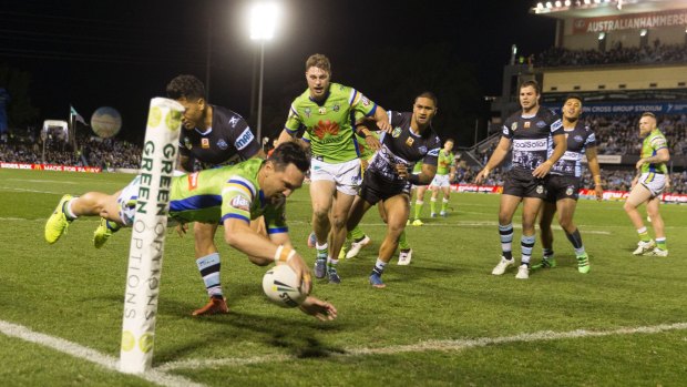 Jordan Rapana of the Raiders scores a try during the Round 22 NRL match between the Cronulla-Sutherland Sharks and the Canberra Raiders.