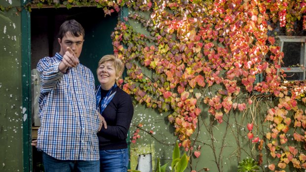 Vanessa Browne with her 22-year-old son Alex, who has Sotos syndrome and requires constant care. 