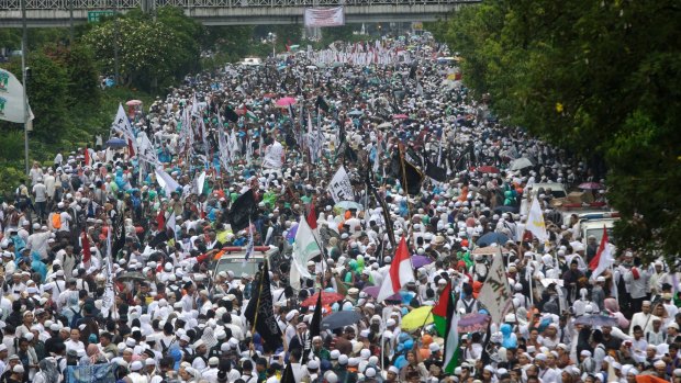 Indonesian Muslims march during a rally against Jakarta's minority Christian governor earlier this month. 