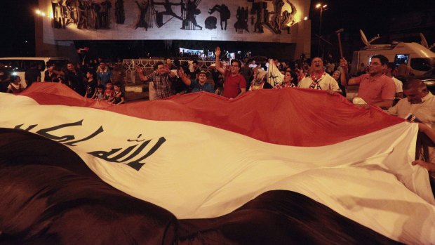 Iraqis celebrate the liberation of Mosul. There are many more battles to be won in Iraq before total victory over Islamic State can be declared.