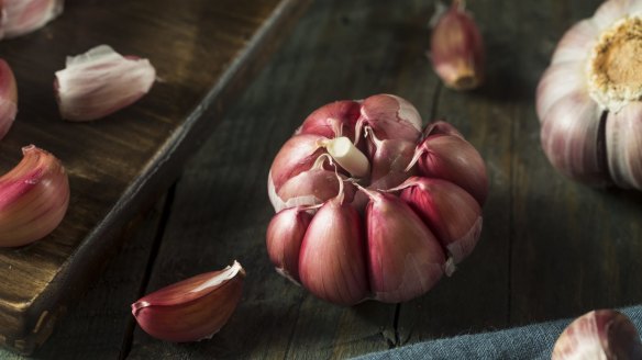 Garlic can be taken as capsules or eaten raw.