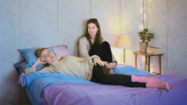 Madeline Bishop's images for <i>The In Between</I>, such as <i>Women reclining in stretchy lounge clothes (detail)</I>, 2016, are insinuative and quietly embracing.