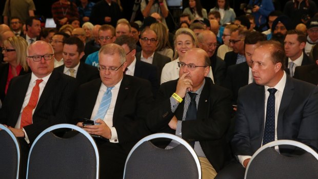 Turnbull ministers Peter Dutton (right) and Senator George Brandis, Scott Morrison, Senator Arthur Sinodinos before the the Coalition national campaign rally.