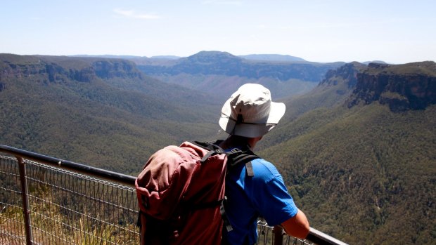 In this file photo, a man is pictured at Evans Lookout. A woman has fallen off the edge of the cliff in front of her friends.