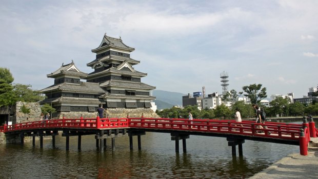 Matsumoto Castle and its red bridge.