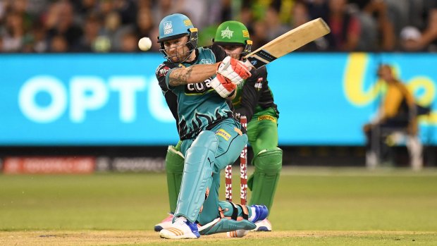 Brendon McCullum of the Heat (left) in action during the Big Bash League cricket match against the Melbourne Stars.