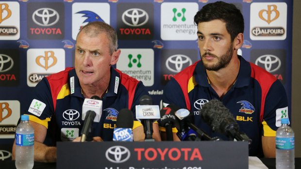 Phil Walsh and Adelaide Crows skipper Taylor Walker earlier this year.