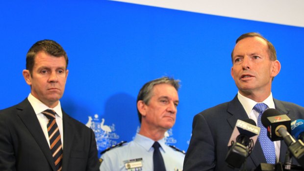 Prime Minister Tony Abbott, right, with NSW Premier Mike Baird and NSW Police Commissioner Andrew Scipione.