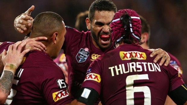 The Maroons  celebrate during the State of Origin.