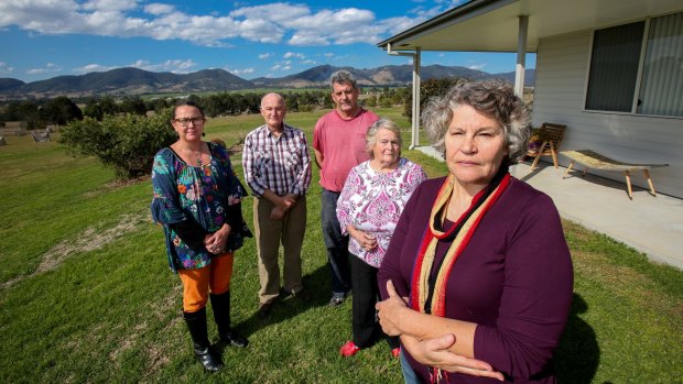 Residents (from left) Dimity Bowden, Bruce Gilbert, Helen Evans, Mick O'Brien and Denise Gilbert at the Gilbert's home which overlooks the proposed Rocky Hill coal mine.