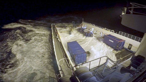 The Go Phoenix being battered by large waves during the search for missing MH370 in the southern Indian Ocean.