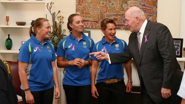 Sally Moylan, left with Ash Gardner and Shelley Nitschke, gets some advice from Governor-General Sir Peter Cosgrove.