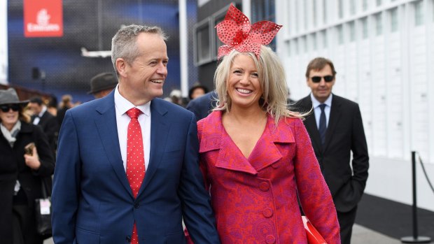 Trackside pitstop: Bill and Chloe Shorten in the Birdcage on Melbourne Cup Day. 