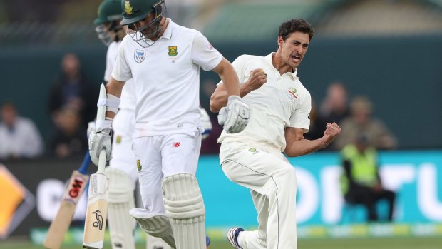 Leading the fight: Mitchell Starc of Australia celebrates the wicket of Dean Elgar.